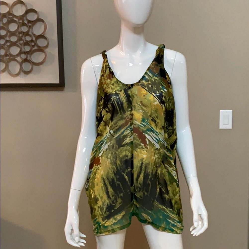 She said....sheer sleeveless blouse